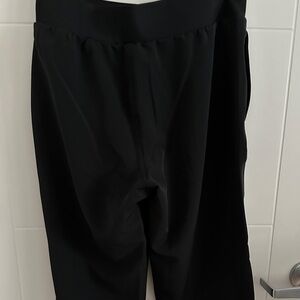 Black Bermuda shorts.